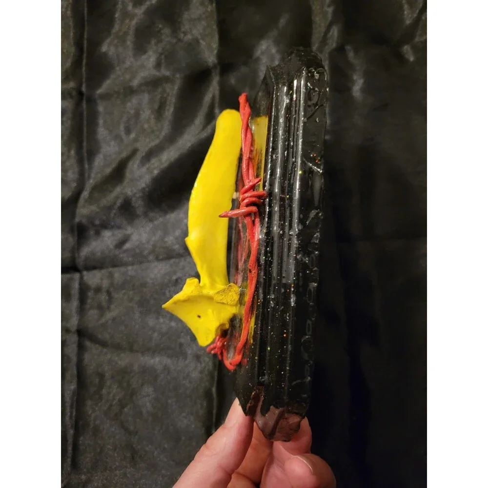 Yellow and red barbed wire bone resin bone plaque